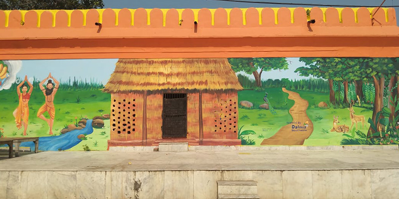 A beautifully painted mural on a building's wall captures attention with its vivid colors and artistic expression.